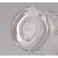 Botella de cristal de ginebra de whisky con decoración.